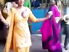 Stunning Indian woman dances around with one of her tits out