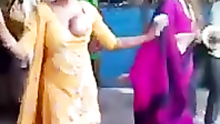 Stunning Indian woman dances around with one of her tits out