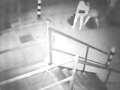 Two drunk girls get caught on security cam pissing really hard