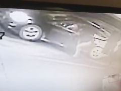 Desperate damsel urinates next to her car