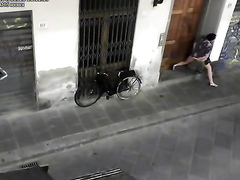 Desperate prostitute pisses in front of someone's doors