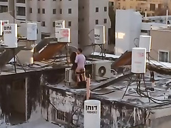 Turkish couple copulates on the top of their building