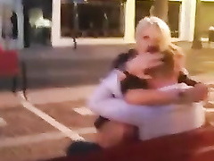 Blonde chick rides her man's member on a bench