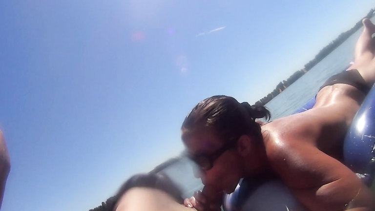 Desirable GF wearing sunglasses gives head in the lake