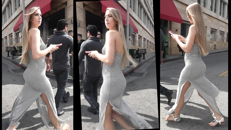 Strong wind plays with a Turkish girl's revealing dress