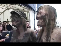 Chubby babes enjoy wrestling each other in the mud