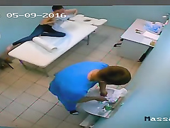 Fit girl gets a nice massage in the fitness club