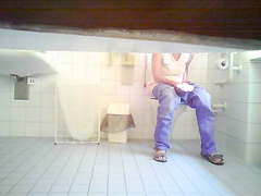 Cutie in jeans makes water in the ladies room