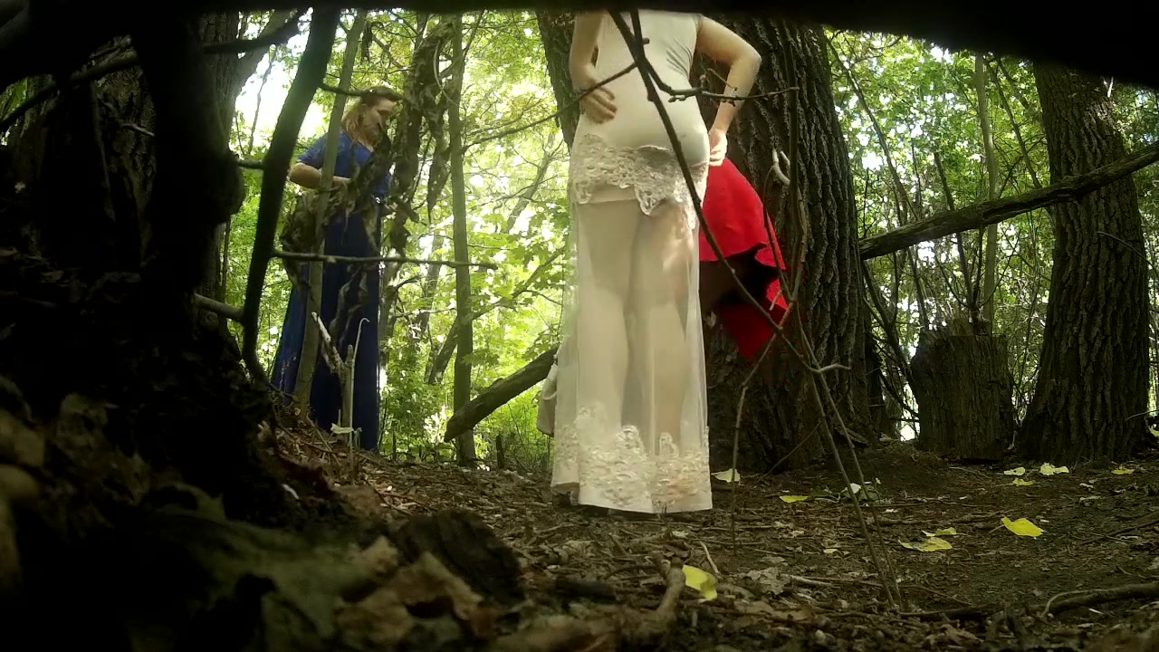 Classy bridesmaids take a piss together in the woods voyeurstyle pic