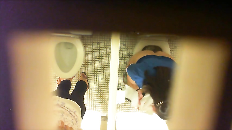 Females get filmed while urinating in the ladies room