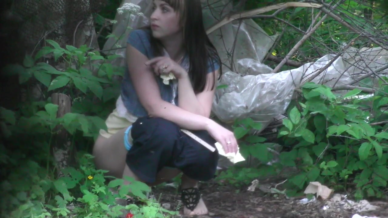 Desperate brunette gets recorded relieving herself in the woods voyeurstyle photo