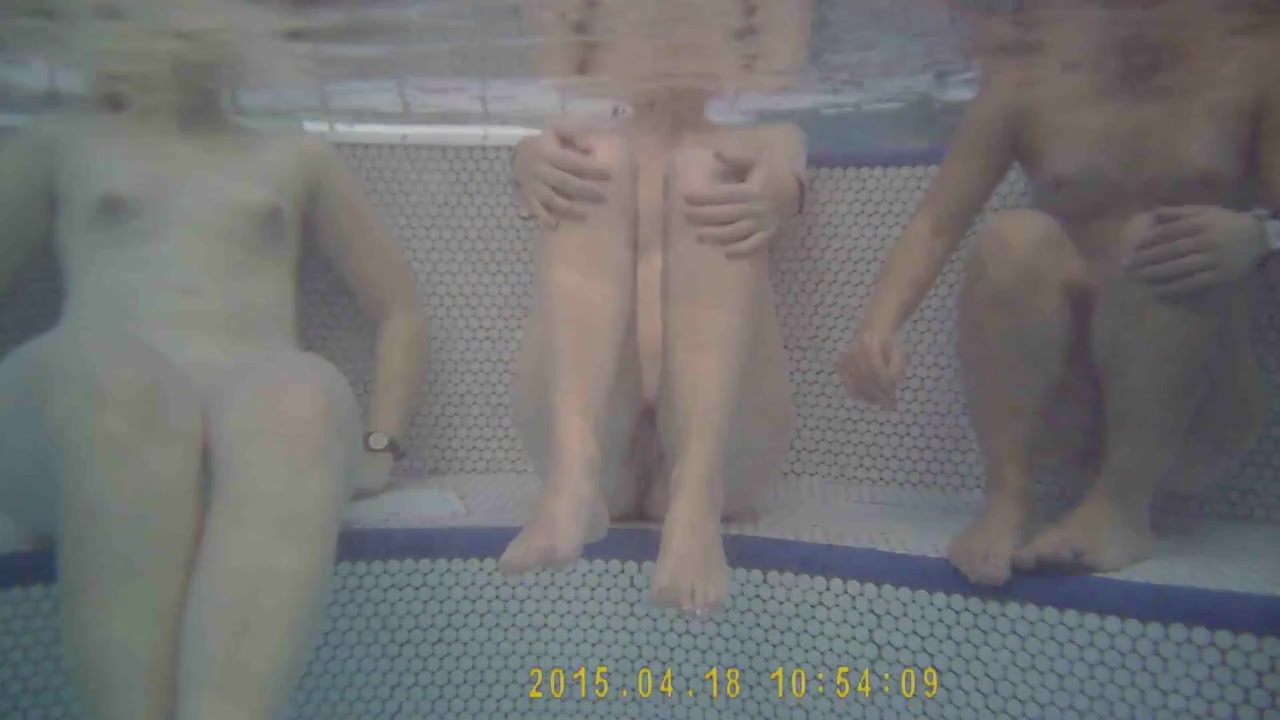 Three fillies enjoy the warm water in the sauna pool voyeurstyle pic