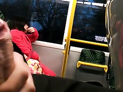 Dude beats off on a lovely Asian lady in the train
