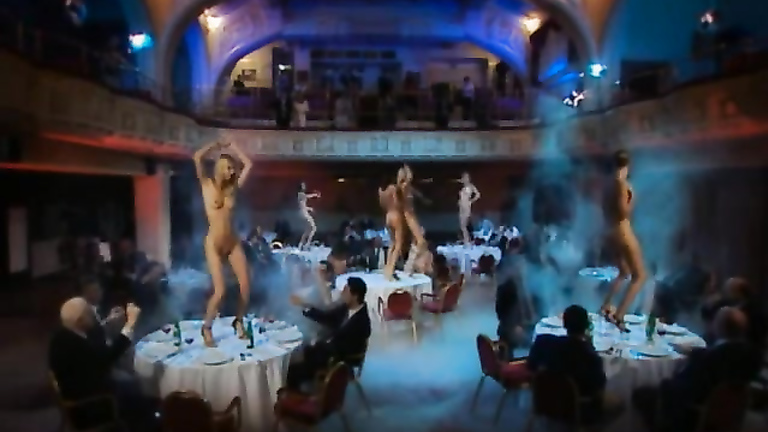 Hot babes perform striptease on the stage and at the tables