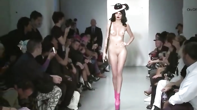 Two stunning models show off hats, bags and boots in the nude