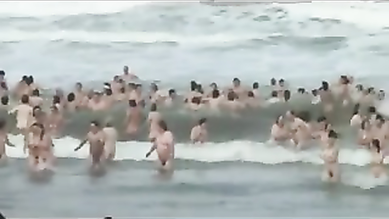 Bunch of people go skinny dipping in order to set a new record