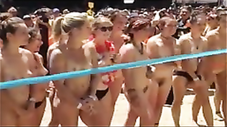Naked students wait for a nudist race to start