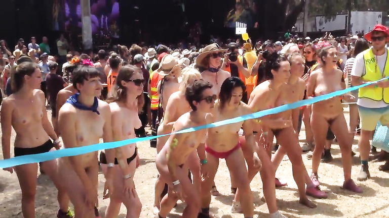 Naked students get ready to compete in a marathon