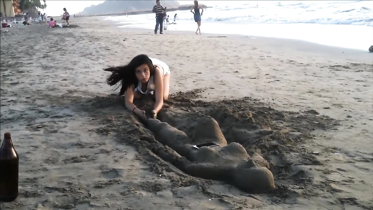 Sexy young brunette gets jizzed at the beach by stranger