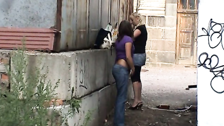 Two Ukrainian girls caught peeing outdoors