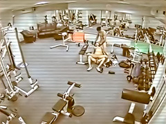 Security camera films a threesome in the gym