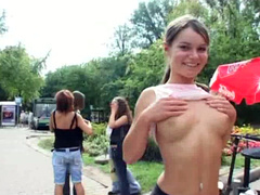 Russian teen girl flashes her great tits in public