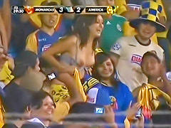 Sexy soccer fan flashes fans by accident