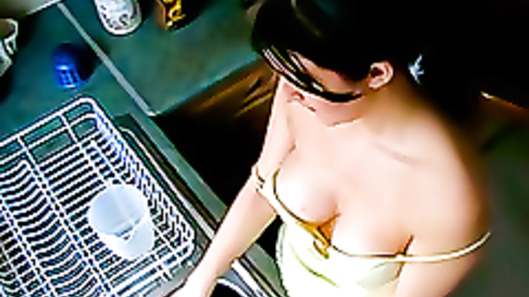 Big breasts brunette does the dishes topless