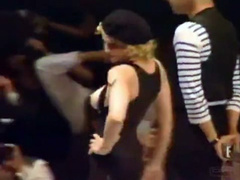 Madonna topless at a fashion show and loving it