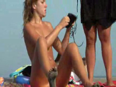 Skinny naked girl puts on her bikini