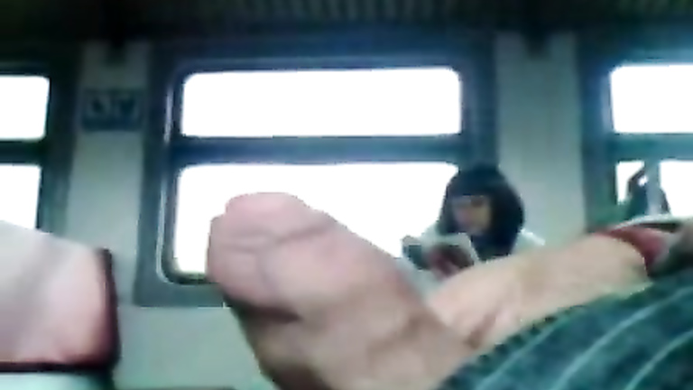 Jacking off uncut cock on the public train