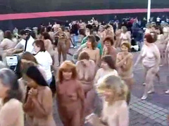 Hundreds of people strip nude to pose for a picture