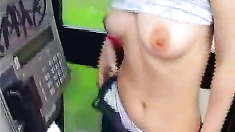 British girl pissing and masturbating at a payphone
