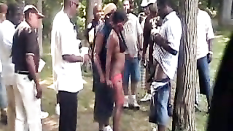 Black hookers make money on a day at the public park