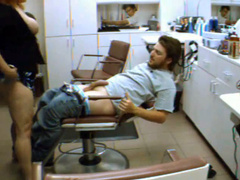 Busty woman penetrated by her man in the salon chair