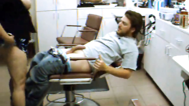 Busty woman penetrated by her man in the salon chair