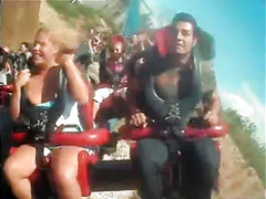 Roller coaster ride makes her big tits pop out