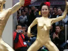 Body painted Thai ladies dance in public