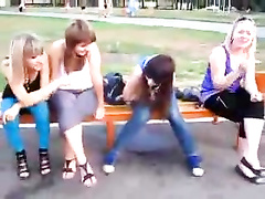 Naughty Russian girl pees through her jeans on public bench