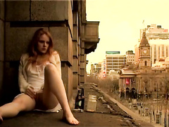 Ginger girl masturbates in public outside her apartment