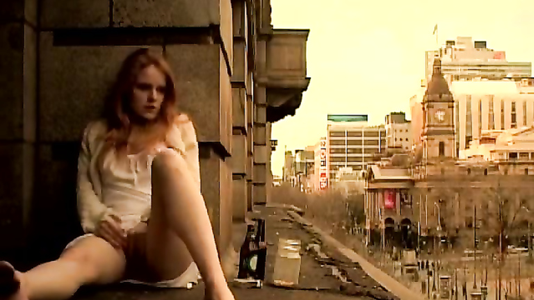 Ginger girl masturbates in public outside her apartment