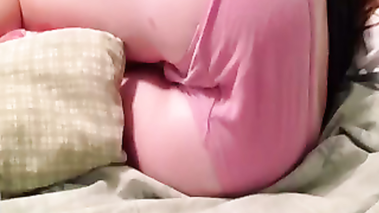Pink panties on girl peeing in her bed