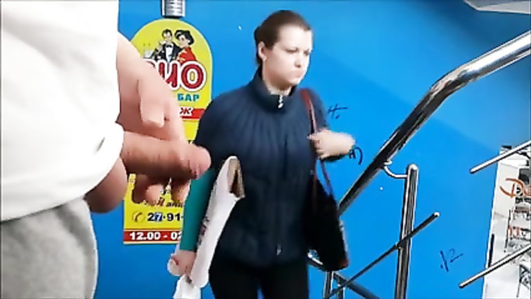 Pretty Russian girl caught a man jacking off in the public place. 