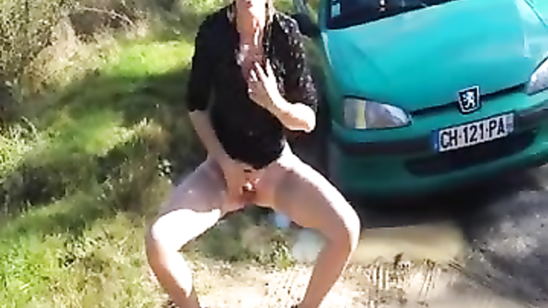 Poland prostitute in high heels and skirt goes pee outdoors