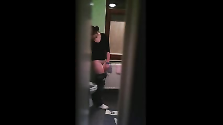 Perv films pretty girl going to the bathroom