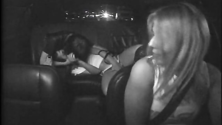 Naughty students fool around in the back of a taxi