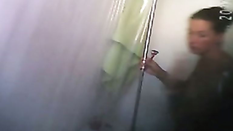 Tattooed chick gets clean in the shower