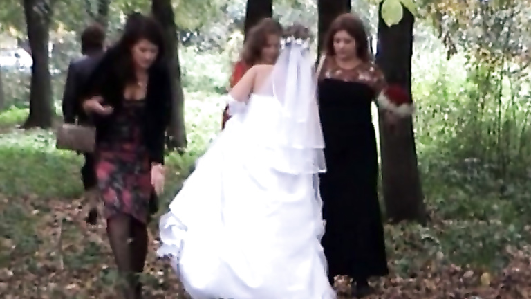 Russian bride and her bridesmaids pee in the woods