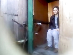 Russian amateur lassie piddles with the door open