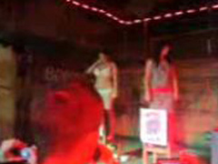 Topless beauty contest at a bar